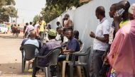 Family and friends gather to discuss the murder of Ghanian undercover reporter Ahmed Hussein Suale at a popular spot where he used to sit and drink with family and friends in Accra, on January 17, 2019. / AFP / RUTH MCDOWALL 