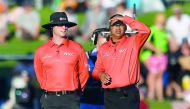 Umpires Shaun Haig and Shaun George (R) look at the sun angle after it halted play during the first one-day international (ODI) cricket match between New Zealand and India at McLean Park in Napier on January 23, 2019. AFP / Marty Melville

