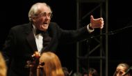 (FILES) In this file photo taken on October 23, 2004 French music composer Michel Legrand leads the Camerata de Bourgogne Orchestra, in Auxerre, during the festival international de Musique et Cinema. AFP / Martin BUREAU