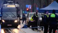 Police and forensic personnel gather at the site of a shooting at The Brederodestraat in Antwerp on February 2, 2019, as they investigate after a shooting at a Turkish cafe. AFP / Belga / NICOLAS MAETERLINCK