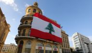 A Lebanese flag hangs from a building in downtown Beirut, Lebanon, November 21, 2017. Reuters/Aziz Taher