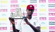 Jason Holder celebrates with the Wisden Trophy after the match Action Images via Reuters/Paul Childs 
