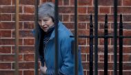 Britain's Prime Minister Theresa May leaves from the rear of 10 Downing Street in London on February 14, 2019 ahead of a vote on amendments to the Brexit withdrawal bill. AFP / Tolga Akmen 