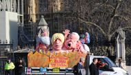 Anti and pro Brexit activists demonstrate, as British parliament votes on governments Brexit motion and a number of amendments which aim to reshape it, around the parliamentary estate in London, England on February 14, 2019. ( Tayfun Salc? - Anadolu Agenc