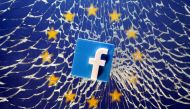 FILE PHOTO: A 3D printed Facebook logo is placed on broken glass above a printed EU flag in this illustration taken January 28, 2019. REUTERS/Dado Ruvic/File Photo