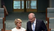 Former Australian foreign minister Julie Bishop (L) walks down the stairs with Prime Minister Scott Morrison at the Parliament House in Canberra on February 21, 2019.  AFP / Mark Graham