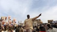 Senegal's President and candidate for the upcoming presidential elections Macky Sall greets his supporters during his campaign rally In Guediawaye, Senegal February 20, 2019. Reuters/Sylvain Cherkaoui