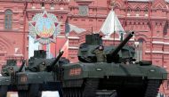 Russian T-14 tanks with the Armata Universal Combat Platforms drive along Red Square during a rehearsal for the Victory Day parade, marking the 71st anniversary of the victory over Nazi Germany in World War Two, in central Moscow, Russia, May 7, 2016. Reu