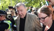 File photo of Cardinal George Pell (C) makes his way to the court in Melbourne on February 27, 2019. / AFP / Con CHRONIS
 