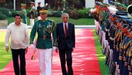 Philippine President Rodrigo Duterte and Malaysian Prime Minister Mahathir Bin Mohamad march together during the welcoming ceremony for the Malaysian leader at the Malacanang presidential palace in Manila, Philippines, March 7, 2019. Reuters/Eloisa Lopez