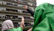 Algerian female protesters shout slogans during a demonstration in the capital Algiers against ailing president's bid for a fifth term on March 8, 2019.  AFP / RYAD KRAMDI