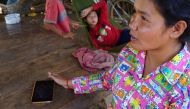 Ol En tells reporters about her failed attampts to contact her daughter in China, at her home in Kampong Cham province, Cambodia, February 18, 2019. Thomson Reuters Foundation/Matt Blomberg