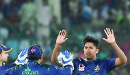 Quetta Gladiators’ Mohammad Hasnain (right) and captain Sarfraz Ahmed celebrate a wicket in this file photo. 