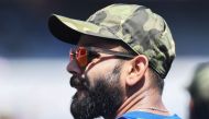 Indian cricket captain Virat Kohli looks on as he attends a training session.(AFP / DIBYANGSHU SARKAR)