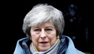 File photo of British Prime Minister Theresa May walks outside Downing Street, as she faces a vote on Brexit, in London, Britain March 13, 2019. REUTERS/Henry Nicholls/File Photo