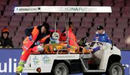 Napoli's David Ospina is stretchered off the pitch after sustaining an injury. Reuters/Ciro De Luca
 