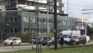 Police take security measures around the scene after a gunman opened fire on tram passengers in Utrecht, Netherlands on March 18, 2019.  Abdullah A??ran - Anadolu 