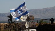 An Israeli flag is seen placed on Mount Bental in the Israeli-annexed Golan Heights on May 10, 2018. AFP/Jalaa Marey