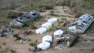 Tents belonging to aid organisations are seen after Cyclone Idai at Guara Guara village outside Beira, Mozambique, March 22, 2019. REUTERS/Siphiwe Sibeko