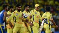 Chennai Super Kings Cricket captain Mahendra Singh Dhoni (2nd R) gestures along with his team after winning the Indian Premier League (IPL) Twenty20 cricket match between Chennai Super Kings and Royal Challengers Bangalore at the M. A. Chidhambaram Stadiu