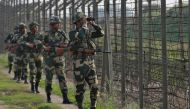 FILE PHOTO: India's Border Security Force soldiers patrol along the fenced border with Pakistan in the Ranbir Singh Pura sector near Jammu February 26, 2019. REUTERS/Mukesh Gupta/File Photo
