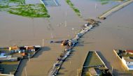Flooded streets in the northern Iranian village of Agh Ghaleh.  AFP / fars news 