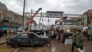 Damaged vehicles are seen after a flash flooding In Shiraz, Iran, March 25, 2019. Tasnim News Agency/Handout via REUTERS 