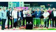 The officials posing for a group picture.