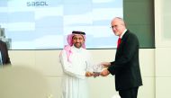 Rigard Du Plessis, Sasol General Manager, receiving CSR recognition by Qatar University.