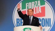 Former Italian prime minister Silvio Berlusconi gestures as he addresses a rally of right-wing Forza Italia party on March 30, 2019 at the Congress Center in Rome, ahead of the May 2019 European elections.  AFP / Andreas SOLARO