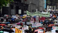 People attend a demonstration to protest against the lack of infrastructures in depopulated areas of Spain´s rural interior, on March 31, 2019 in Madrid. / AFP / OSCAR DEL POZO