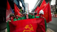 Members of the Philippine communist movement hold a lightning protest in Manila on March 25, 2019. The group called for the resumption of peace talks with the government. AFP / Noel Celis 