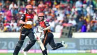 Sunrisers Hyderabad’s Jonny Bairstow (left) and his team-mate David Warner run between the wickets during the IPL match against Royal Challengers Bangalore, yesterday. 