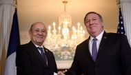 French Foreign Minister Jean-Yves Le Drian (L) and US Secretary of State Mike Pompeo shake hands before a meeting at the US Department of State April 4, 2019, in Washington, DC. / AFP / Brendan Smialowski