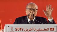 Tunisian President Beji Caid Essebsi waves to his supporters during the launch of his party Nidaa Tounes' congress in the coastal city of Monastir, about 160 kilometres south of the capital Tunis, on April 6, 2019. / AFP / FETHI BELAID