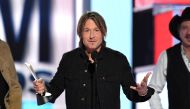 Keith Urban accepts the Entertainer of the Year award onstage during the 54th Academy Of Country Music Awards at MGM Grand Garden Arena on April 07, 2019 in Las Vegas, Nevada. Kevin Winter/Getty Images/AFP
