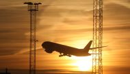 (FILES) In this file photo taken on November 17, 2017 An airplane takes off as the sun sets in Stockholm airport in Sweden. AFP / Ludovic MARIN