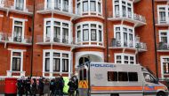 A police van is seen outside the Ecuadorian embassy after WikiLeaks founder Julian Assange was arrested by British police in London, Britain, April 11, 2019. (REUTERS/Peter Nicholls)