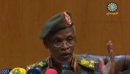An image grab from a broadcast on Sudan TV shows Lieutenant General Omar Zain al-Abdin, the head of the political military committee assigned by the chief of the new military council, addressing a press conference on April 12, 2019 in the capital Khartoum