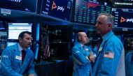 (FILES) In this file photo taken on April 09, 2019 traders work ahead of the closing bell on the floor of the New York Stock Exchange (NYSE) in New York City. AFP / Johannes Eisele 