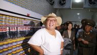 North Korean leader Kim Jong Un inspecting the Kumsanpho Fish Pickling Factory with his wife Ri Sol Ju in South Hwanghae Province, North Korea. (Picture by KCNA on August 8, 2018 via KNS) 