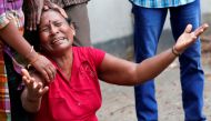 A relative of a victim of the explosion at St. Anthony's Shrine, Kochchikade church, reacts at the police mortuary in Colombo, Sri Lanka April 21, 2019. Reuters/Dinuka Liyanawatte