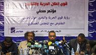 Sudanese civil society activists Muawia Shaddad (C-L) and Omar el-Digeir (C-R), two of the leaders from the protest movement led by the Alliance for Freedom and Change, give a press conference in the capital Khartoum on April 24, 2019.   AFP / OZAN KOSE