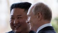 Russian President Vladimir Putin welcomes North Korean leader Kim Jong Un prior to their talks at the Far Eastern Federal University campus on Russky island in the far-eastern Russian port of Vladivostok on April 25, 2019. / AFP / POOL / Alexander Zemlian