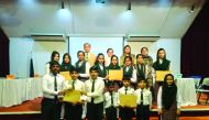 Nargis Raza Otho, Principal of Pakistan International School Qatar, with winners of the competition during the event. 