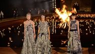 Models present creations by Christian Dior during the Croisiere 2020 collection fashion show at Badi palace in Marrakesh, on April 29, 2019. AFP 