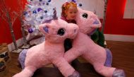 A girl plays with Unice Unicorn, at the launch of Hamleys top Christmas toys launch in London, Britain, September 26, 2018. Reuters/Peter Nicholls 