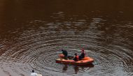 Forensic officers search Kokkinopezoula lake, also known as 
