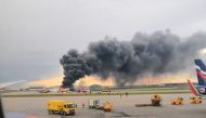 A passenger plane is seen on fire after an emergency landing at the Sheremetyevo Airport outside Moscow, Russia May 5, 2019. The Investigative Committee of Russia/via Reuters