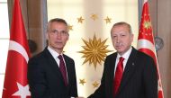 Turkish President Recep Tayyip Erdogan (R) shakes hands with NATO Secretary General Jens Stoltenberg as they pose for a photograph prior to their meeting at the Cankaya Palace in the capital Ankara, on May 06, 2019. AFP 
